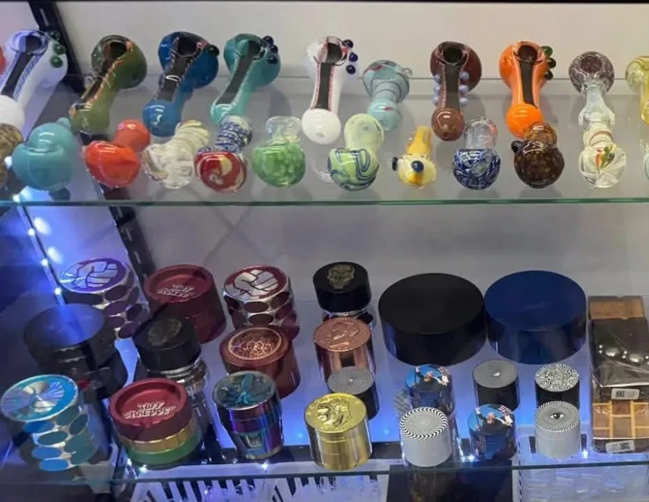Glass hand pipes and accessories in the lit display case